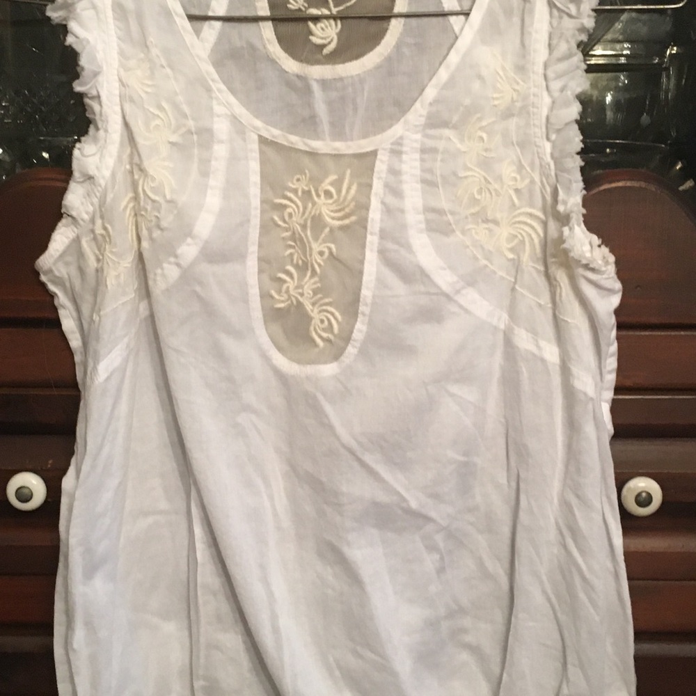 Free People small, embroidered, ruffle trim, and lace insert panels. Beautiful